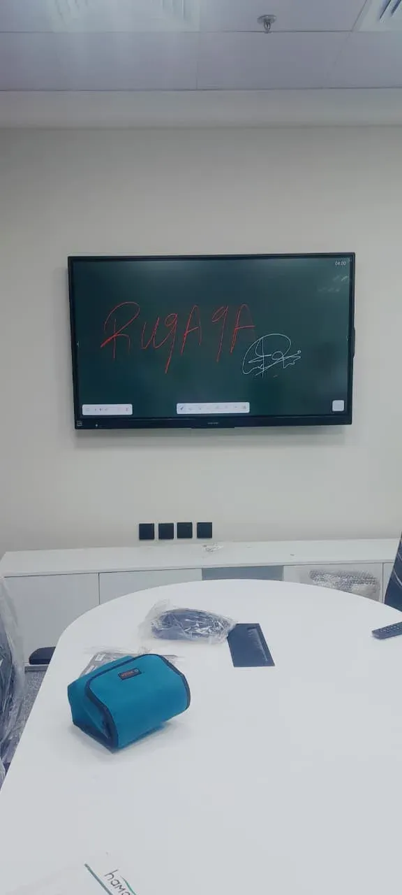 Ruqaqa wall-mounted collaborative interactive display in a meeting room