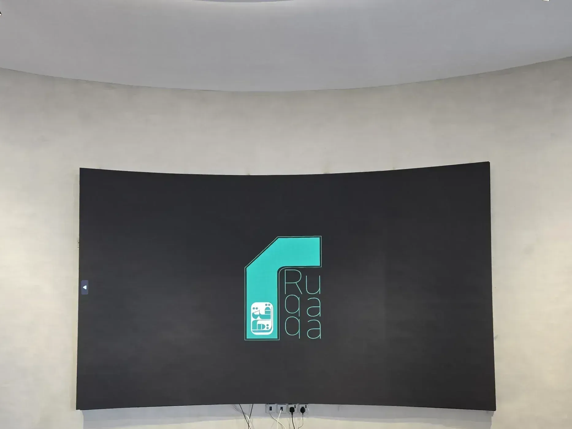 Ruqaqa flexible curved LED screen wrapping an architectural surface for an immersive display