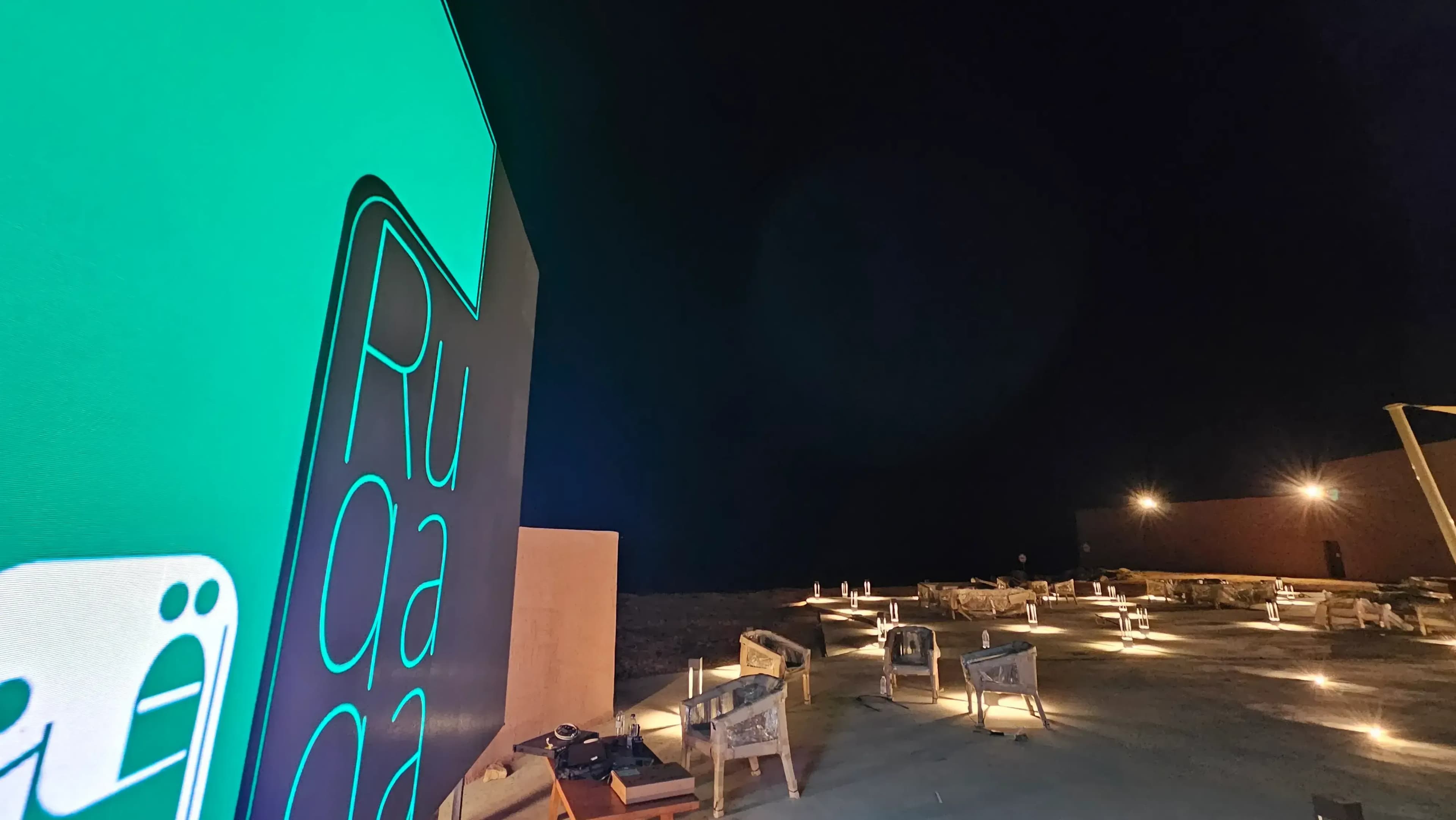 Outdoor Rental LED Screen that displays Ruqaqa Logo that we installed for one of our clients at the beach on the Red Sea in NEOM Region